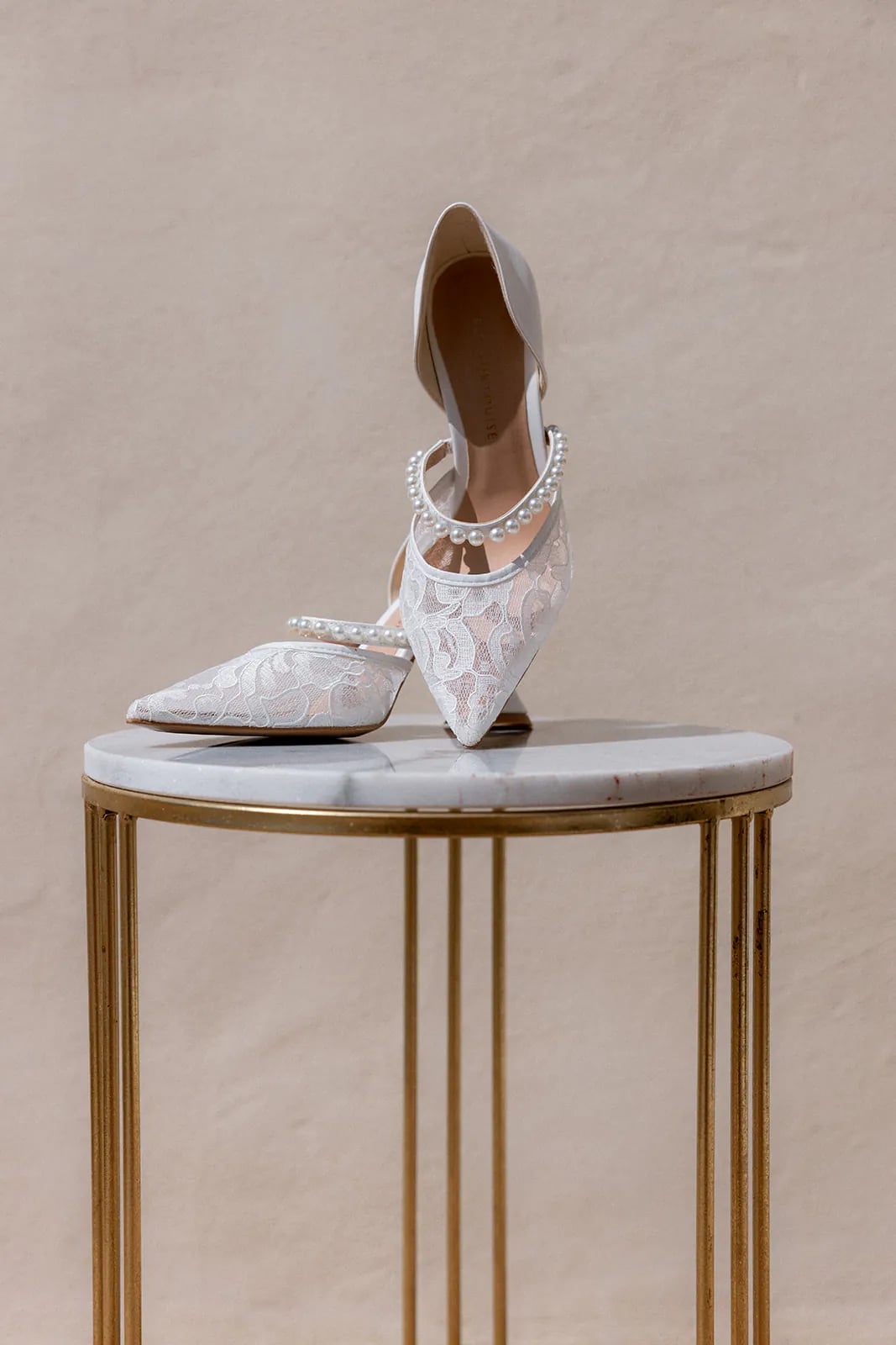 Lace and pearl bridal shoes
